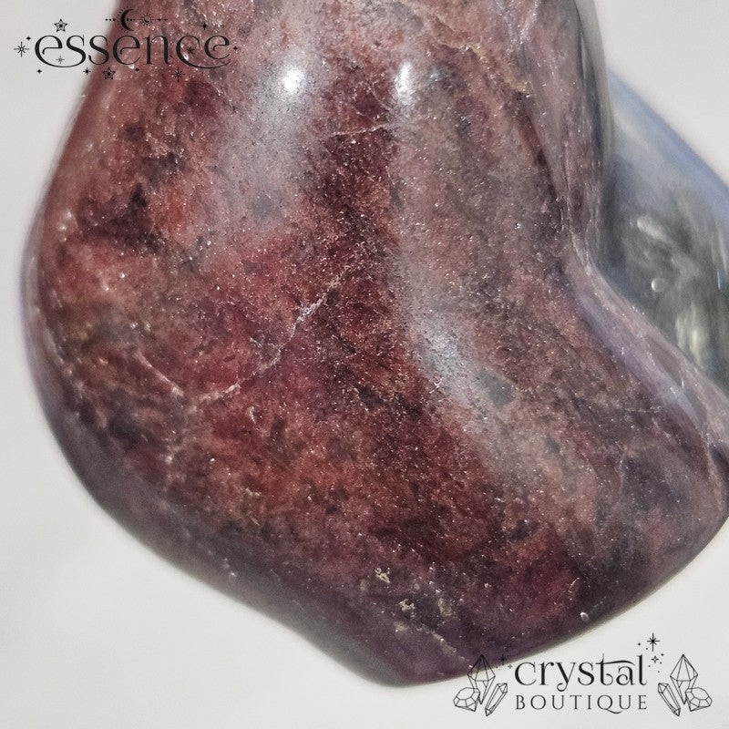 Garnet with Astrophyllite Torso Carving