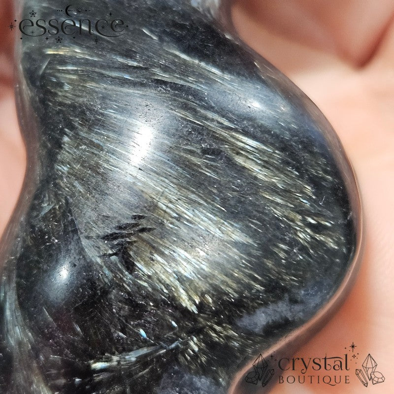 Garnet with Astrophyllite Torso Carving