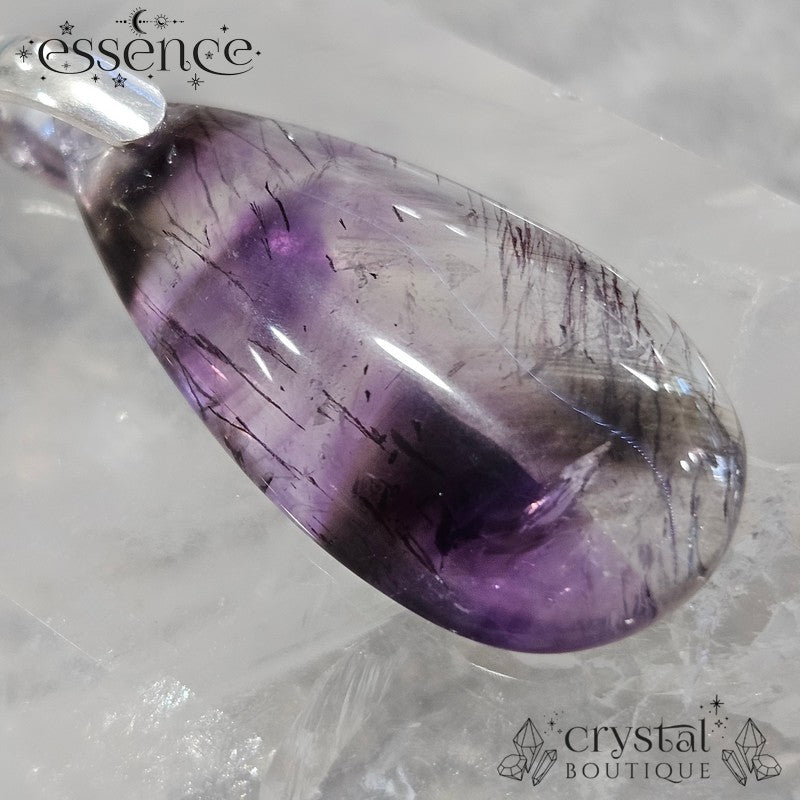 Cacoxenite in Amethyst Pendant
