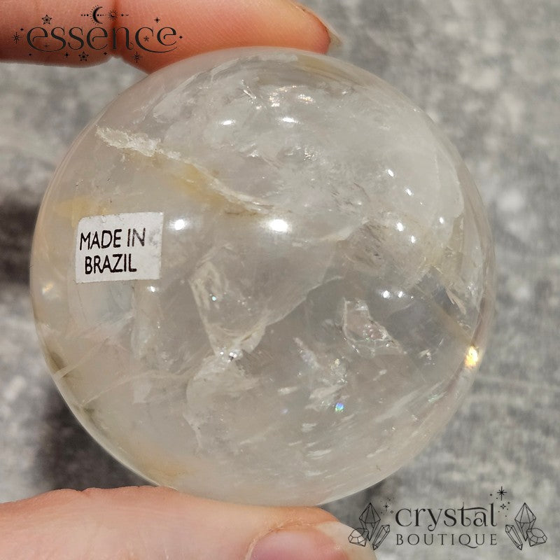 Clear Quartz Sphere with some Iron Inclusions 162gms