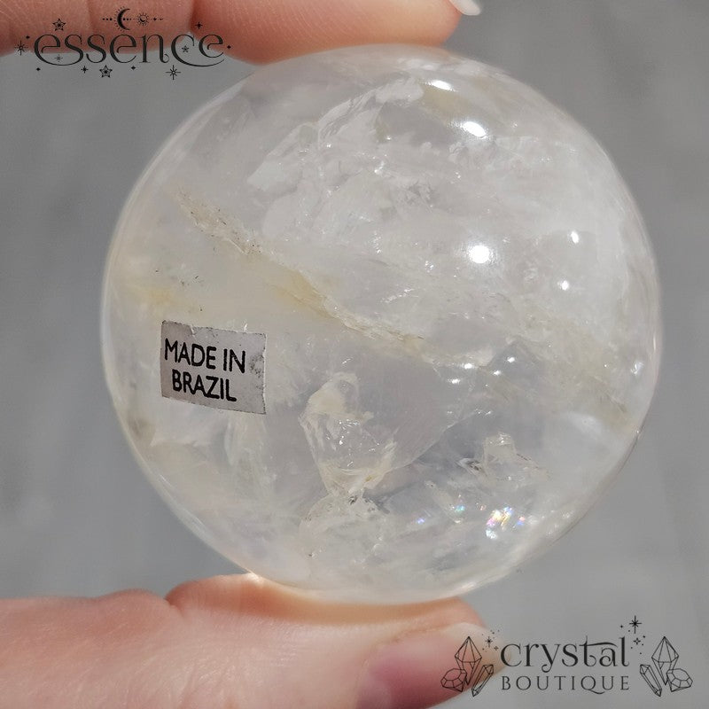 Clear Quartz Sphere with some Iron Inclusions 162gms