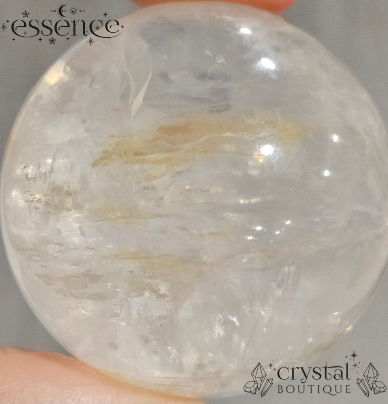 Clear Quartz Sphere with some Iron Inclusions 162gms