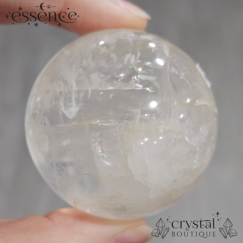 Clear Quartz Sphere with some Iron Inclusions 162gms