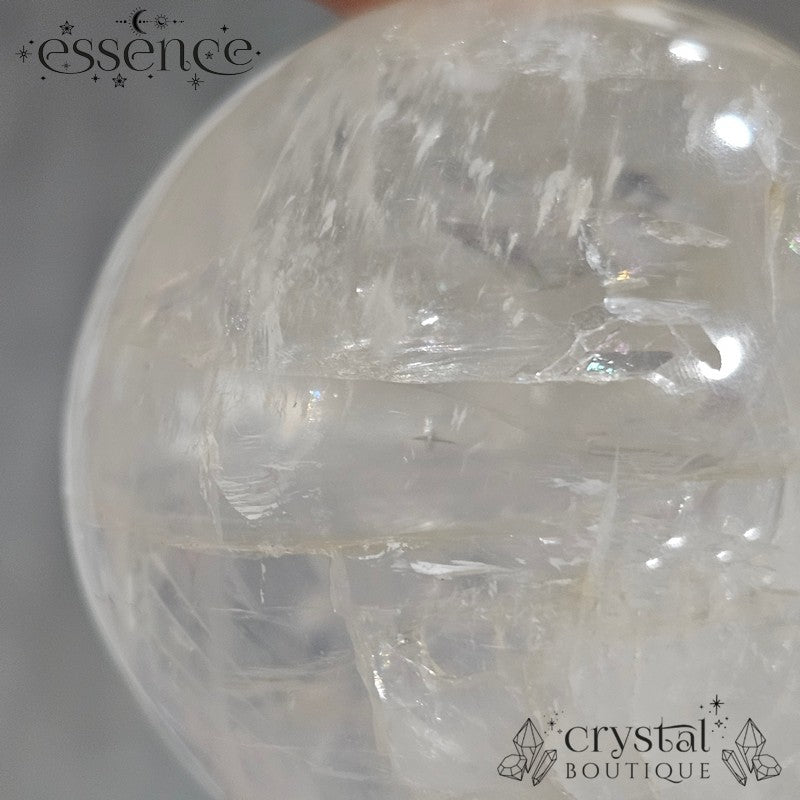 Clear Quartz Sphere with some Iron Inclusions 162gms