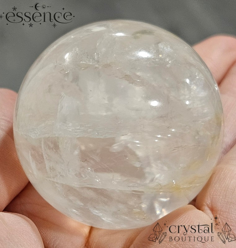 Clear Quartz Sphere with some Iron Inclusions 162gms