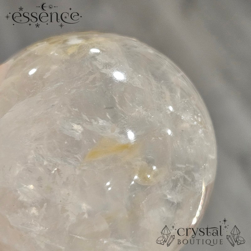 Clear Quartz Sphere with some Iron Inclusions 162gms