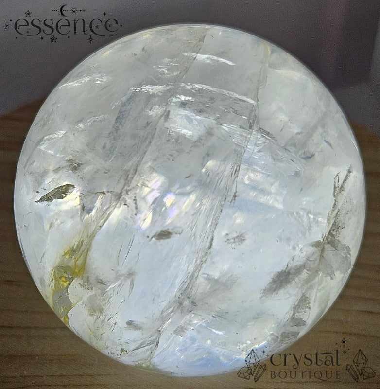 Clear Quartz Sphere with some Iron Inclusions 162gms