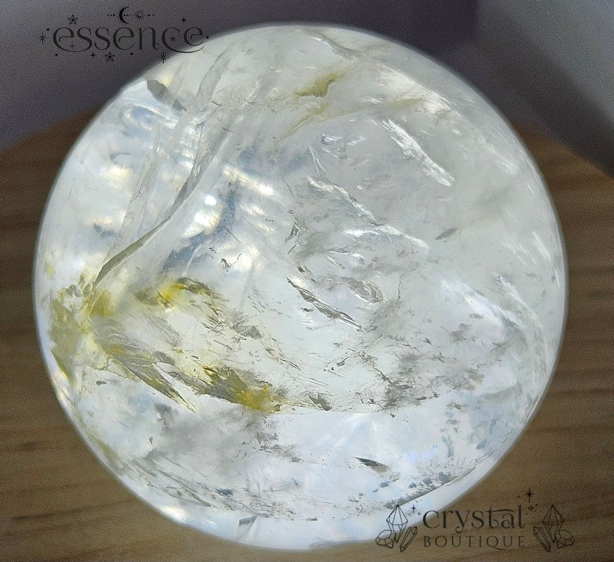 Clear Quartz Sphere with some Iron Inclusions 162gms