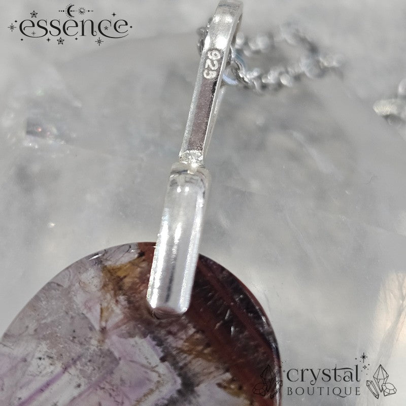 Cacoxenite in Amethyst Pendant
