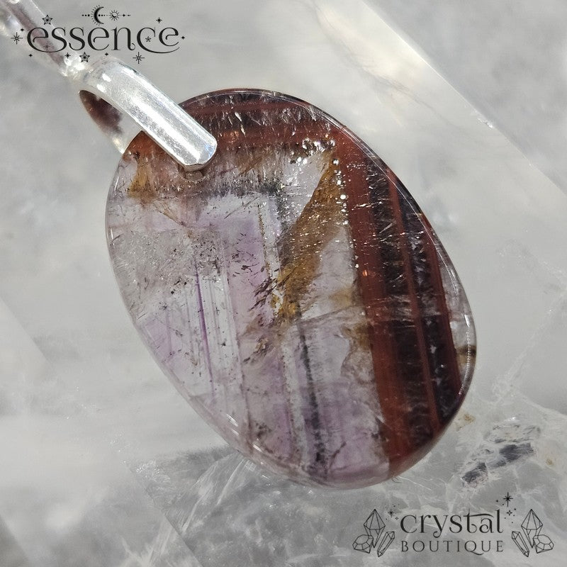 Cacoxenite in Amethyst Pendant