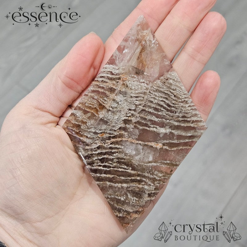 Thousand Layer Quartz Polished Freeforms on stand