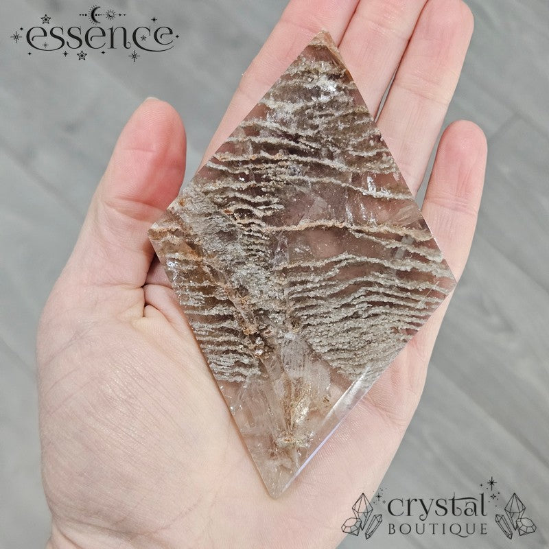 Thousand Layer Quartz Polished Freeforms on stand