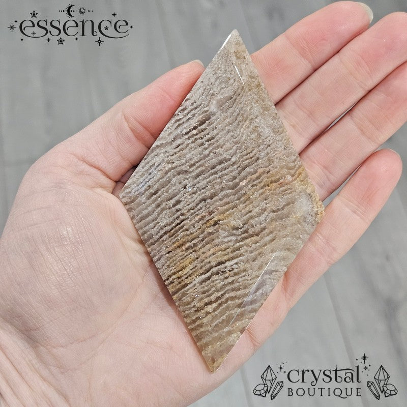 Thousand Layer Quartz Polished Freeforms on stand